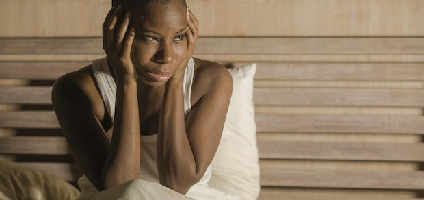 Woman awake in bed