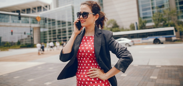 professionally dressed woman on the phone