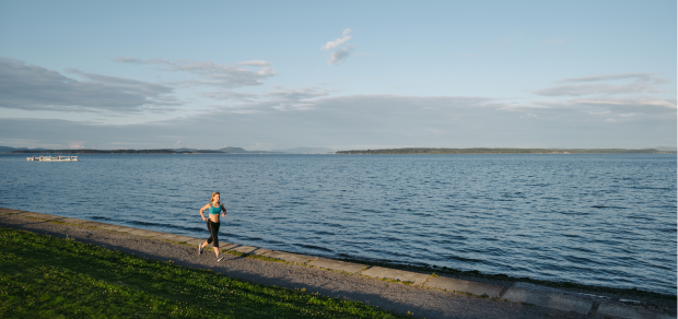 woman jogging along the beach