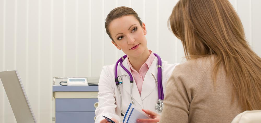 woman doctor consulting with a patient