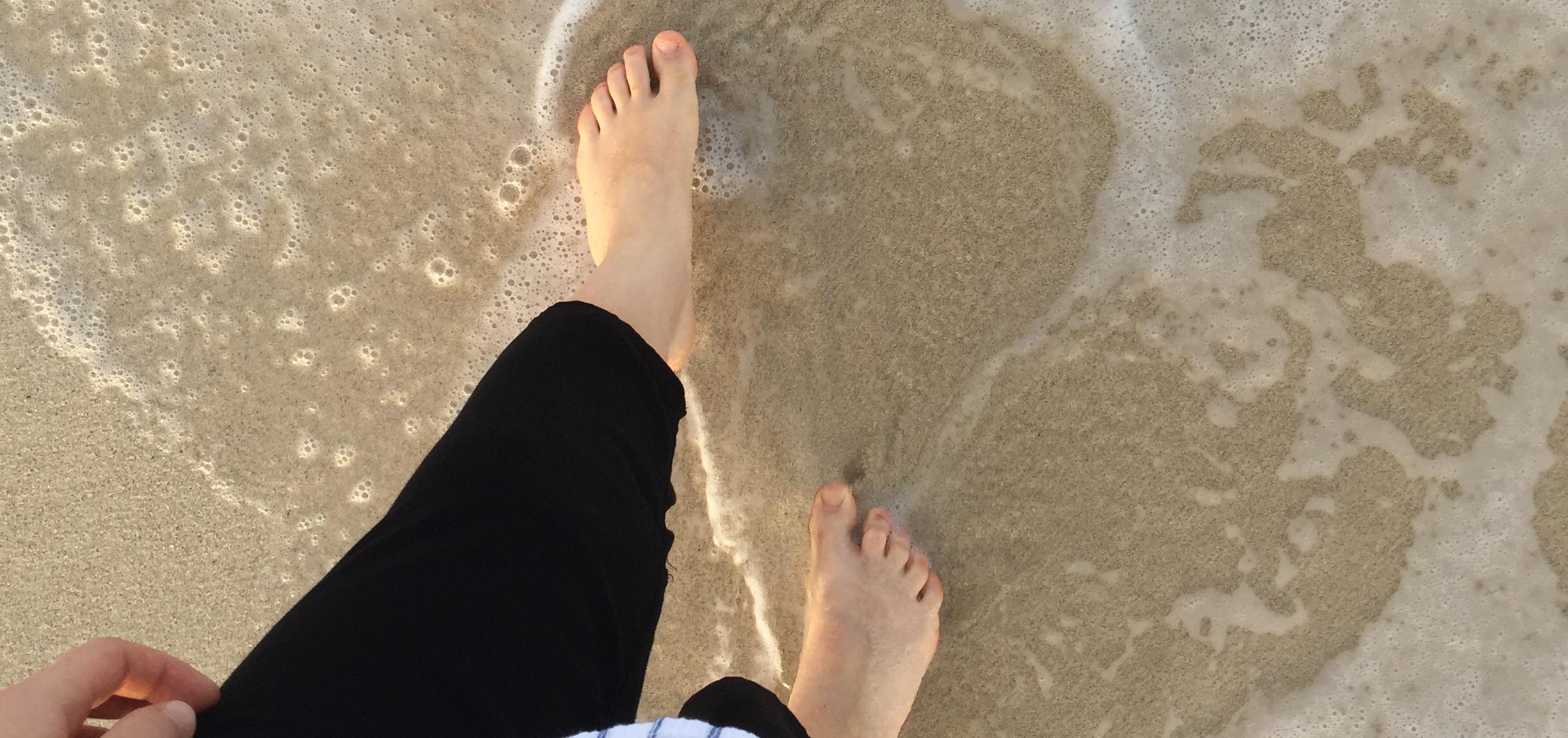 bare feet on the sand