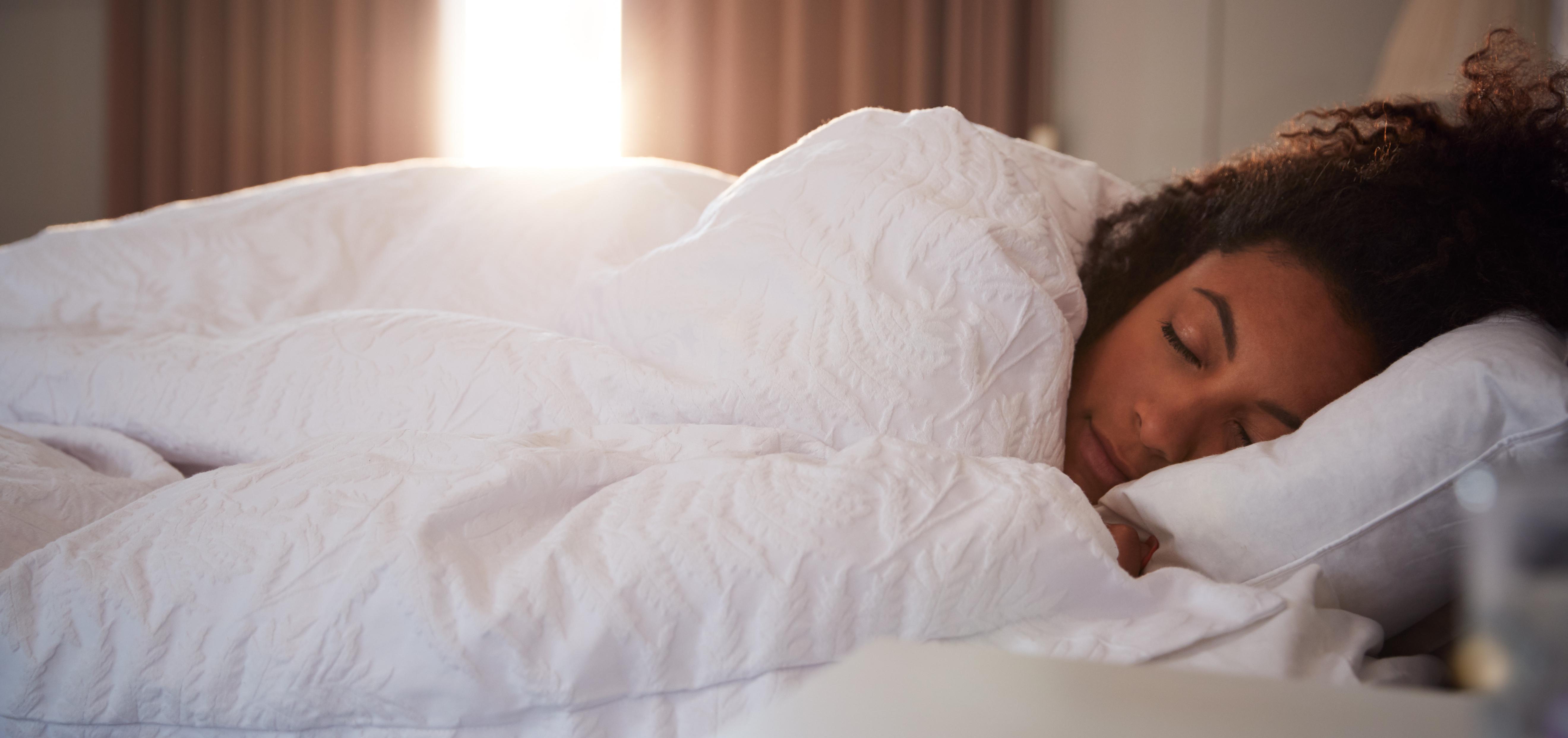 woman sleeping in bed