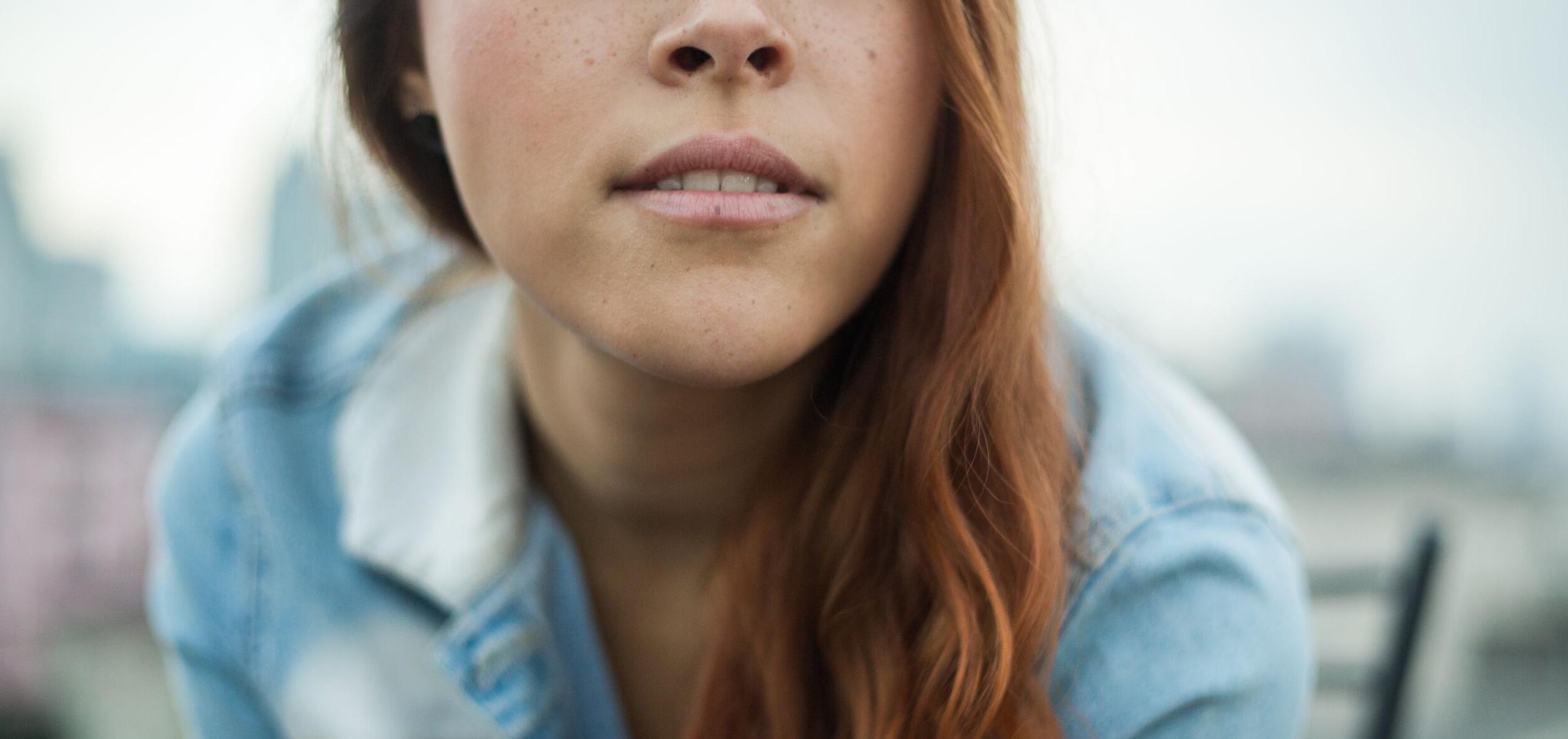 lower half of a young woman's face