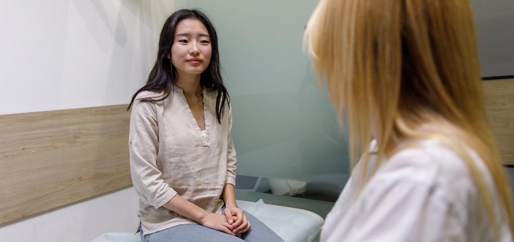 woman talking to her doctor