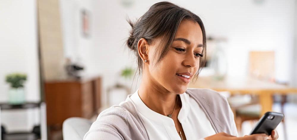 woman looking at her phone