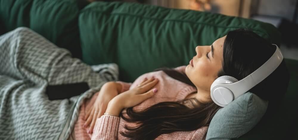 woman deep breathing for stress-relief to help digestion