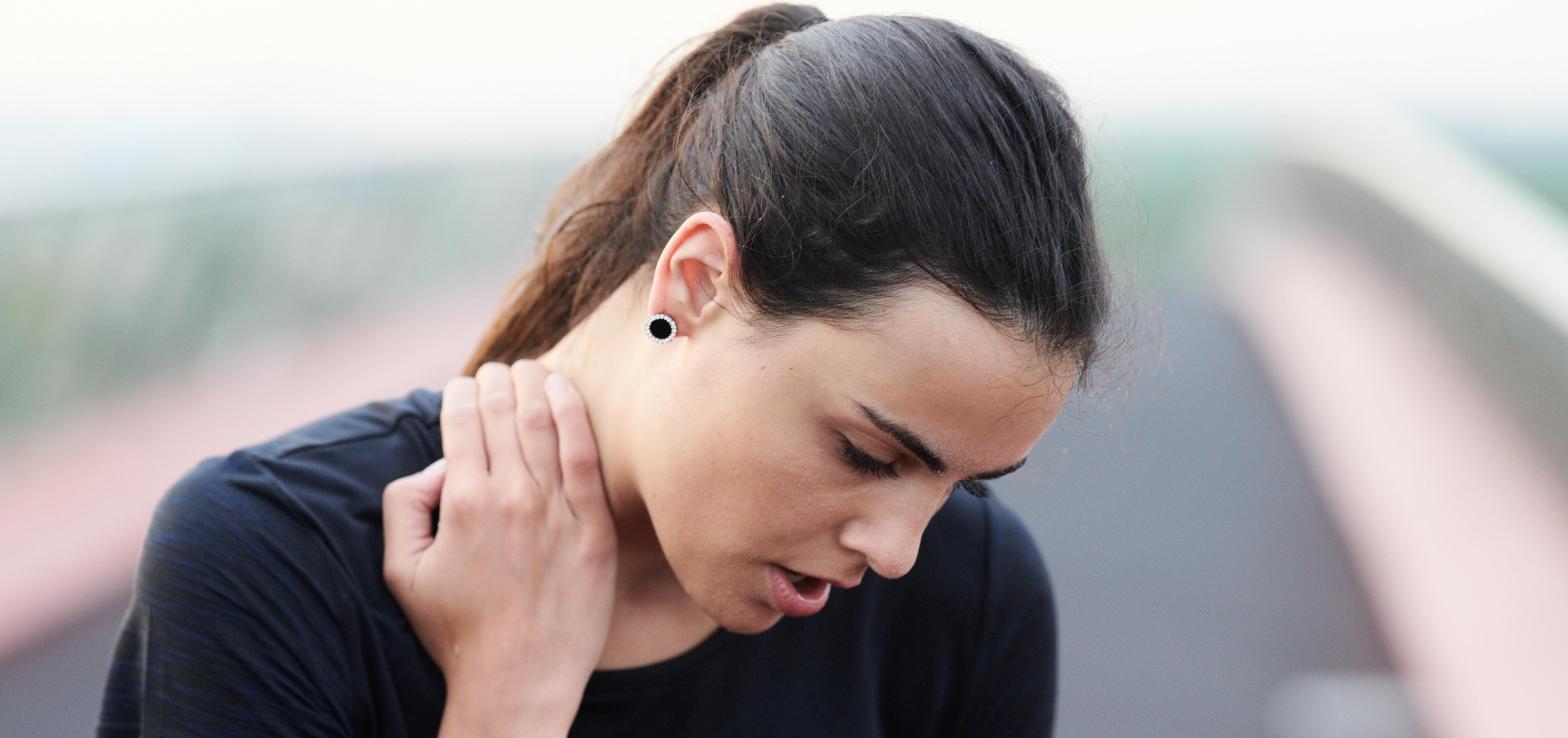 woman who is feeling ill