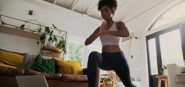 woman doing yoga at home